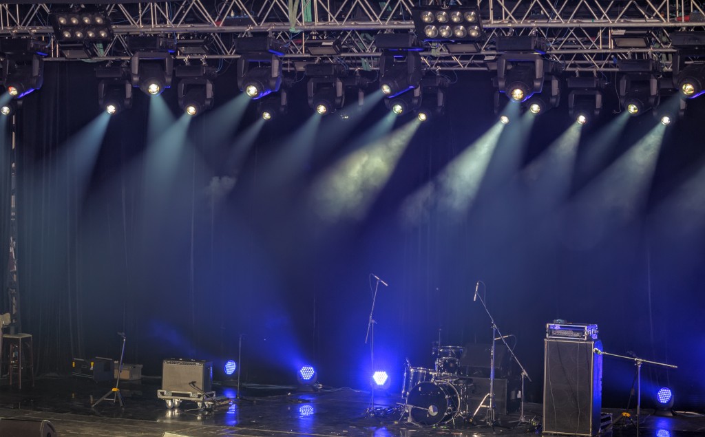 Spotlights and illumination on stage with sound equipment