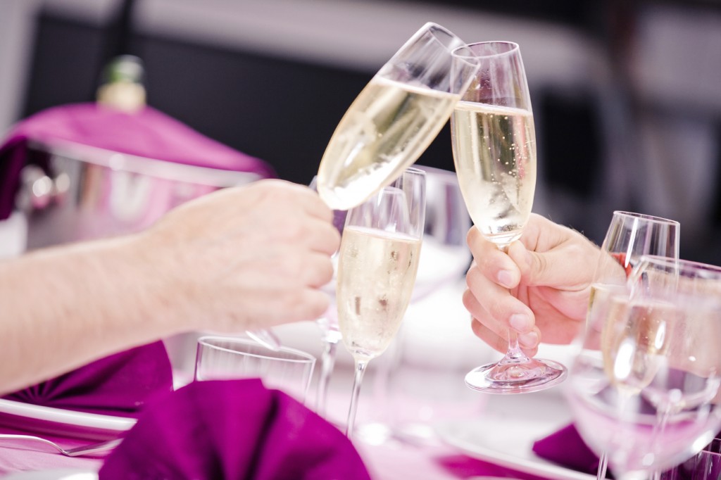 Champagne Glasses Clink - iStock_000020486635_Medium