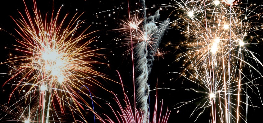 Exploding fireworks against a black sky background