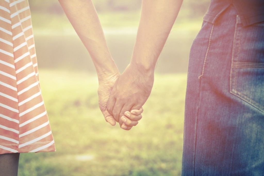 Couple holding hands on valentine's day